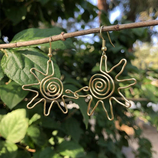 Creative golden sun earrings