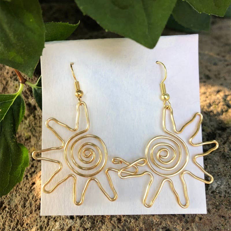 Creative golden sun earrings