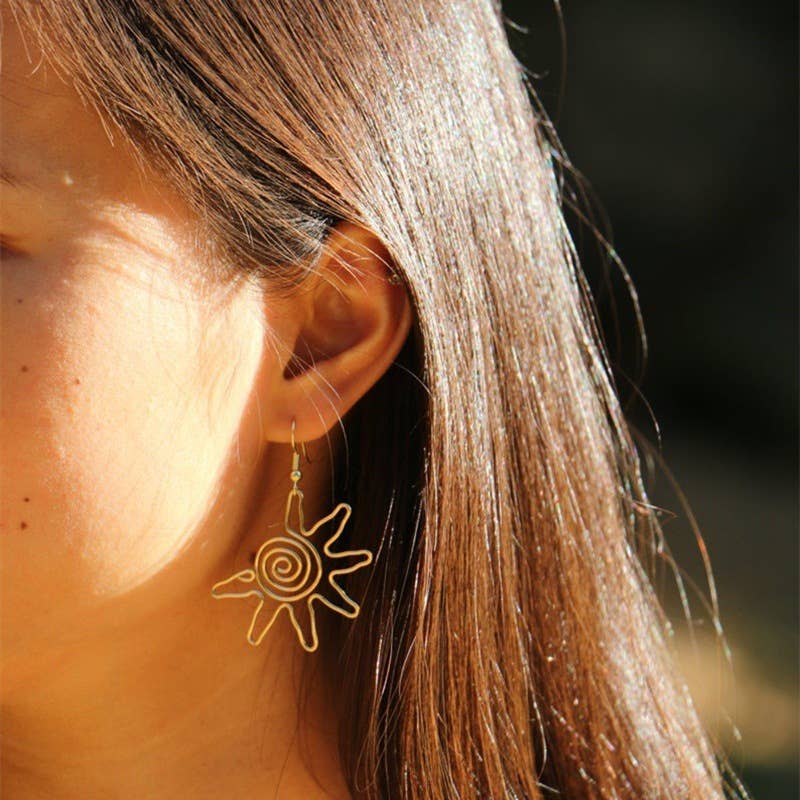 Creative golden sun earrings